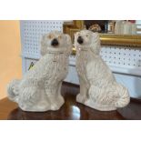 A pair of Staffordshire pottery Spaniel dogs, approximately 12in (30.5cm) high, together with an