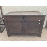 A 17thC oak Coffer, with two front panels, two panelled lid and two side panels, raised on stile