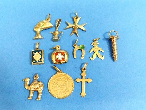 A collection of eleven 18ct yellow gold Charms / small Pendants, eight marked including Maltese