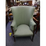 A 19th century mahogany show-frame tub Armchair, with upholstered back, arms and seat, ring-turned