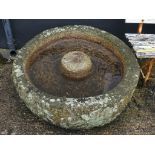 Antique granite circular grinding Trough, 42in diameter x 12½in high (107cm x 32cm). Note; This