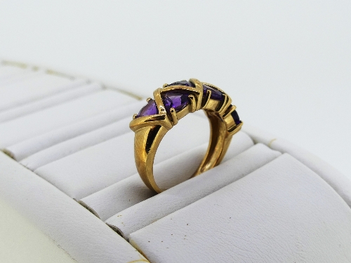 A six stone amethyst Ring, each triangular shaped stone with a gold spacer between, marked 375 on - Image 2 of 2