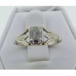 A single stone Diamond Ring, the central baguette stone approx 5mm x 7mm, approx 1ct, set in an 18ct