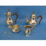 A George V silver harlequin four piece Tea Set, the teapot, sugar bowl and cream jug all by