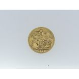 A George V gold Sovereign, dated 1926.