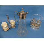 A silver plate mounted glass Claret Jug, with etched fruit and vine decoration and star cut base,