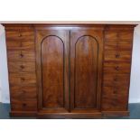A 19thC mahogany 'Gillows-style' Breakfront Clothes Press, 81½in (207cm) wide x 24in (61cm) deep x
