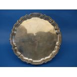 An Edwardian silver Salver, by Barker Brothers, hallmarked Chester, 1909, of shaped circular form,