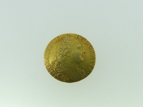 A George III gold Guinea, dated 1776, with crowned shield coat of arms reverse, 8.4g, 24mm - Image 2 of 2