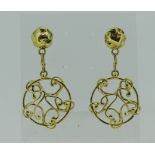 A pair of 18ct yellow gold circular Earrings, of twisted openwork form, suspended from circular