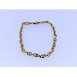 A 18ct yellow gold Bracelet, with figure of eight shaped links, approx total weight 11g.