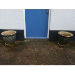 A pair of earthenware Plant Pots and Saucers, 18in diameter x 16½in high (46cm x 42cm) (2) Note;