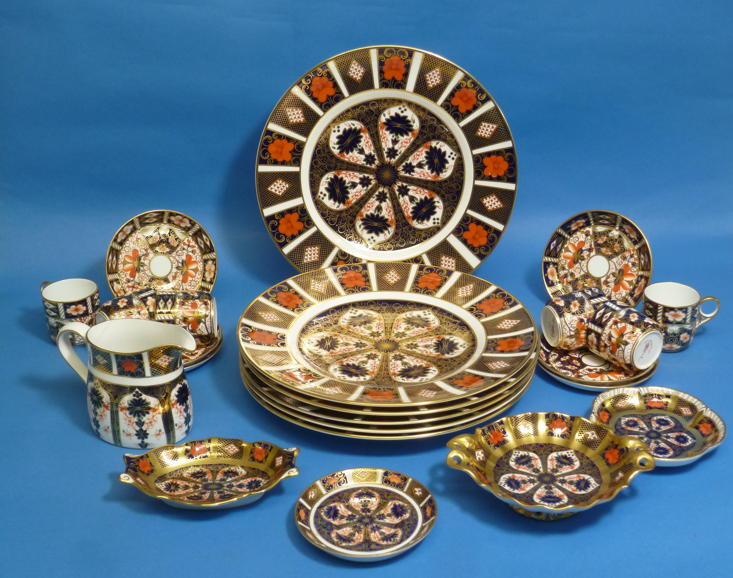 A set of six Royal Crown Derby Imari 2451 pattern Coffee Cans and Saucers, together with a set of