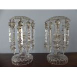 A pair of antique plain cut-glass Lustres, each lustre suspending ten drops, two drops missing, 9½in
