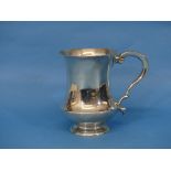 A George V silver Mug, hallmarked London, 1922, of baluster form with scroll handle, 5in (12.5cm)
