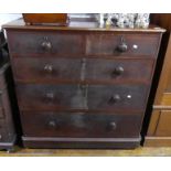 A Victorian mahogany Chest of Drawers, with two short drawers over three long, wooden knob