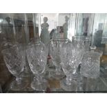 A quantity of cut crystal Glassware, including six hock glasses, seven liqueur glasses, two