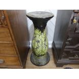 An early 20th century pottery Jardiniere Stand, green ground with tube-lined floral decoration, 28in