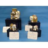A set of four Royal Crown Derby elephant Paperweights, comprising 'Raj' signature and colourway
