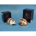 A Royal Crown Derby Hedgehog Paperweight, decorated in imari palette with silver stopper to base,