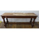 An Edwardian mahogany Window Seat, the rectangular top with moulded edge, on turned supports