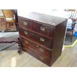 An antique mahogany two-part Chest of Drawers, the rectangular top with brass draper's yard rule,