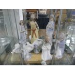 Five Lladro figurines, including Nativity figures Mary and Joseph, together with three Lladro