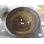 A large hardwood Bowl, the underside with turned ridging decoration, 15¼in diameter x 5¼ in deep (