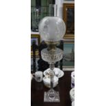 An Edwardian silver-plated Oil Lamp, by Walker & Hall, formed as a square fluted column with