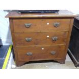 A stained pine three drawer Chest of Drawers, 36in (91.5cm) wide, 34in (86cm) high.