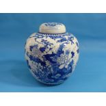 A Chinese blue and white porcelain Ginger Jar and Cover, painted with bird, butterflies and