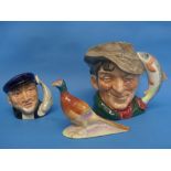 A Royal Doulton 'The Poacher' Toby Jug, of large size, with factory marks to base, together with a