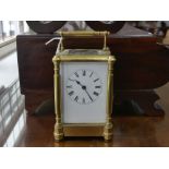 A French gilt brass Carriage Clock, of traditional five-glass form, clock not working, 6½in (16.5cm)