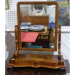 A Victorian mahogany dressing table Mirror, the rectangular plate between scrolled supports on