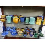 A large collection of Brannam Pottery Commemorative Ware, together with a plain blue Baron