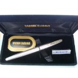 A French silver Waterman Fountain Pen, marked Argent Massif, with engine turned decoration and