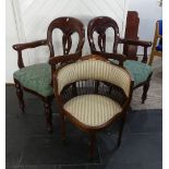A pair of Victorian style mahogany Carver Chairs, the pierced back splat with foliate motifs,