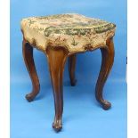 A Victorian rosewood framed Stool, the tapestry work stuff-over top upon four cabriole legs and