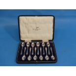 A cased set of twelve George V silver Teaspoons, by Walker & Hall, hallmarked Sheffield, 1927,