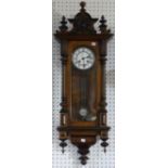 An early 20th century walnut Vienna Regulator style Wall Clock, 37?in (95cm) high.