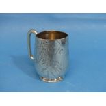 A Victorian silver Christening Mug, hallmarked Sheffield, 1879, of circular form with plan handle,