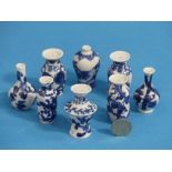 Eight Chinese porcelain blue and white 'Doll's House' Miniature Vases, Qing dynasty, with floral