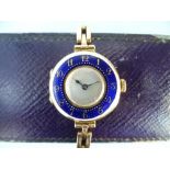 A pretty continental 9ct gold and blue enamel lady's Wristwatch, with Swiss 15-jewels movement,