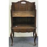 An early 20thC continental oak Open Cabinet, the two open shelves contained with in moulded surround