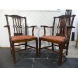A pair of Victorian mahogany framed Carver Chairs, in the Chippendale style, the craved top rails