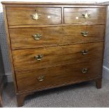 A Victorian mahogany Chest of Drawers, the two short above three long drawers, graduated in size,