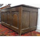 A large 18thC oak panelled Coffer, the front with three incised deocrative panels, with highed lid