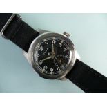 A Cyma WWW Military "Dirty Dozen" stainless steel Wristwatch, the black dial with broad arrow and