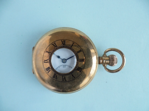 A 9ct gold Half-Hunter Pocket Watch, with Swiss 15 Jewels movement signed 'The Comet', No. 187064,