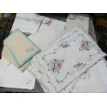 Vintage textiles: a quantity of mid 20thC table linens, mostly place mats and napkins, but including